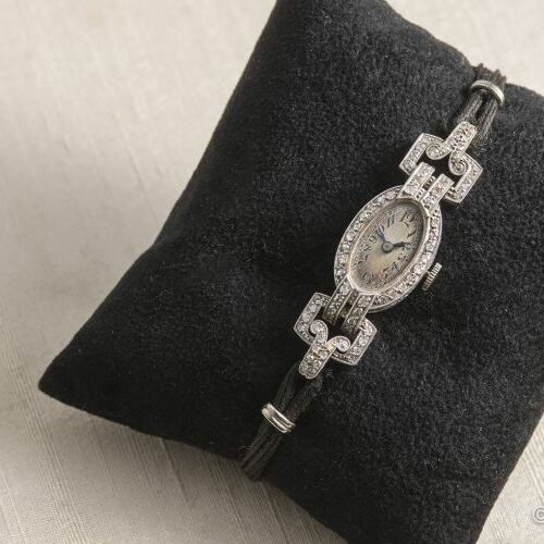 Orologio gioiello in platino con diamanti. Epoca anni '20