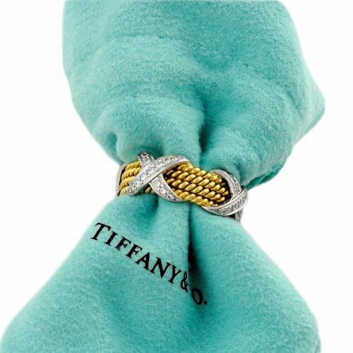 Anello eternity in oro e platino recante brillanti. Tiffany & Co.